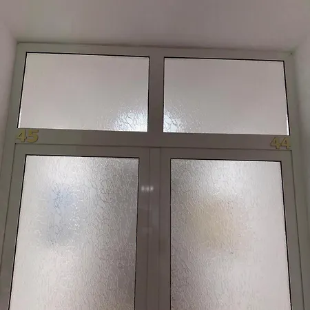Em