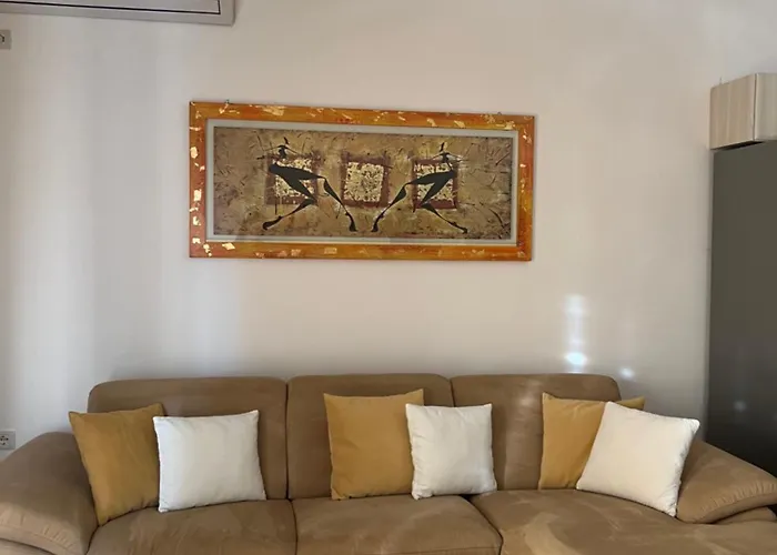 Em *
